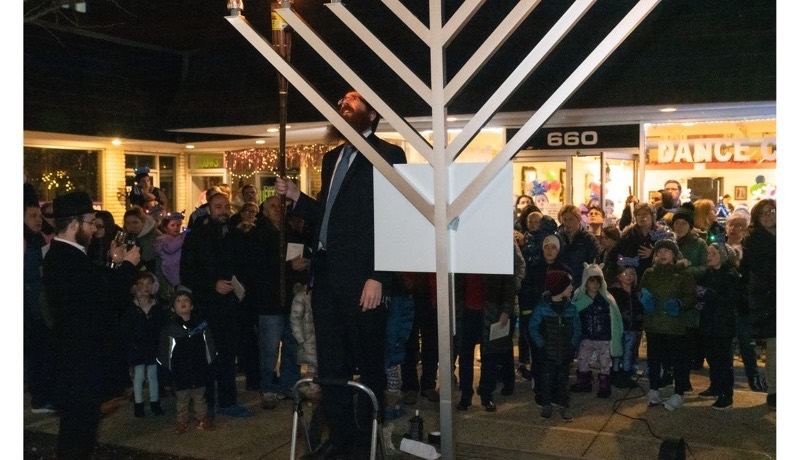 The community gathered for the public menorah lighting in Glencoe